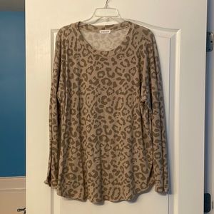 Womens leopard top. Size 1X. First Love